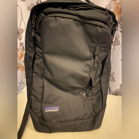 Patagonia Black Rolling Duffle Bag with Grab Handle and Multiple Pockets - Picture 1 of 14